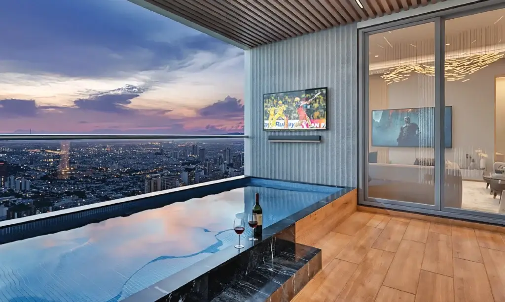 Luxury rooftop pool with city views at Gera Avive Towers, Kharadi, Pune. Perfect for relaxation and.