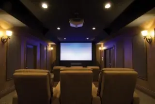 Modern home theater setup at Gera Avive Towers Kharadi.