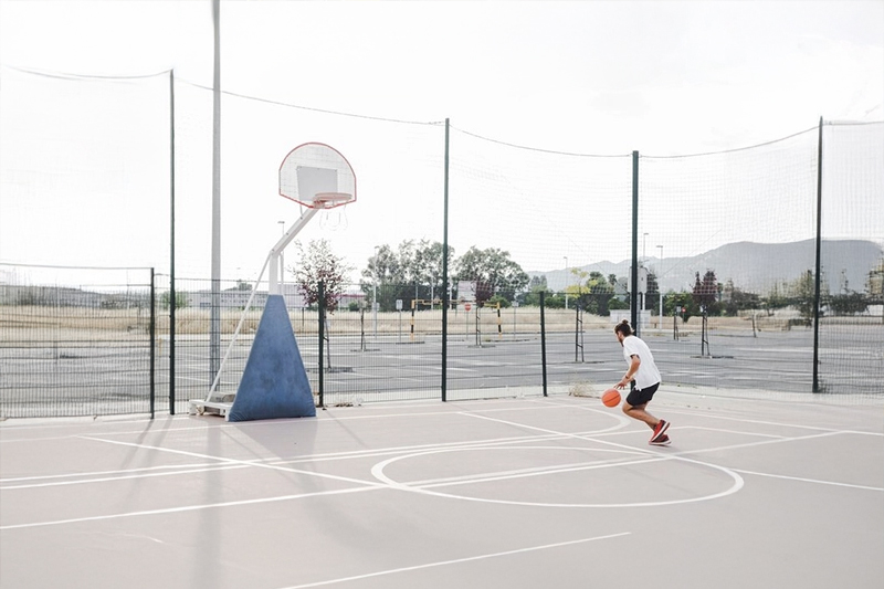 Modern outdoor basketball court at Kohinoor Kaleido residential complex in Pune.