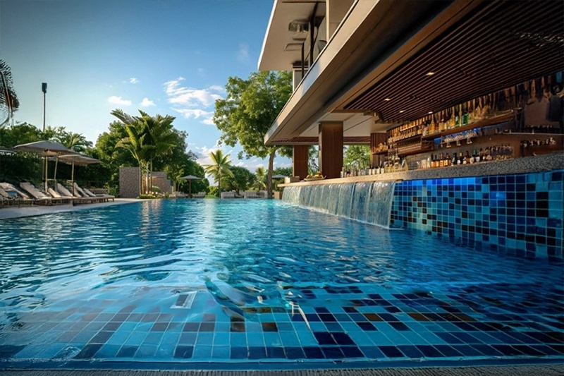 Pool at Kohinoor Kaleido residential complex in Pune, featuring modern design and scenic surrounding.